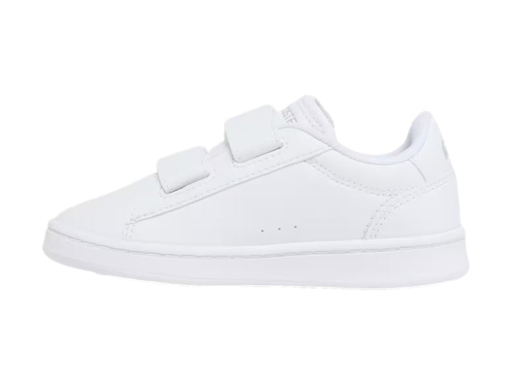 Tenis blancos Lacoste Carnaby Set con cierre de velcro y logotipo del cocodrilo en el costado.