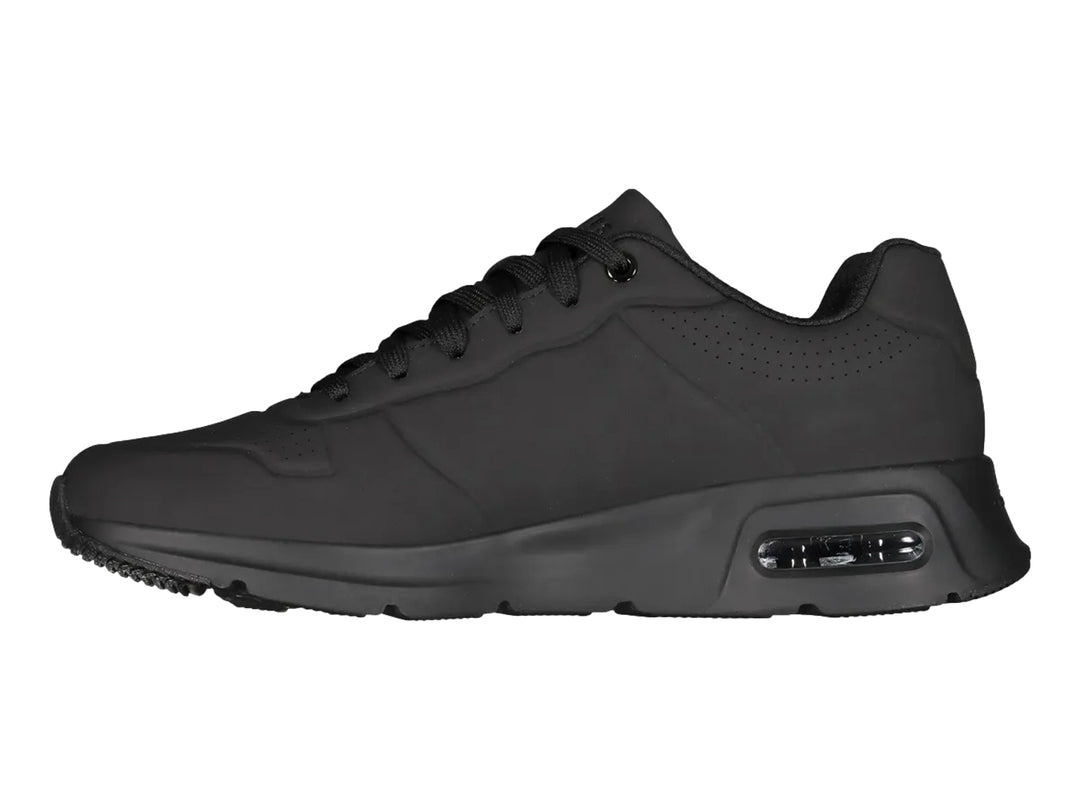 Tenis deportivos Skechers para hombre en color negro con suela amortiguada y acabado mate.