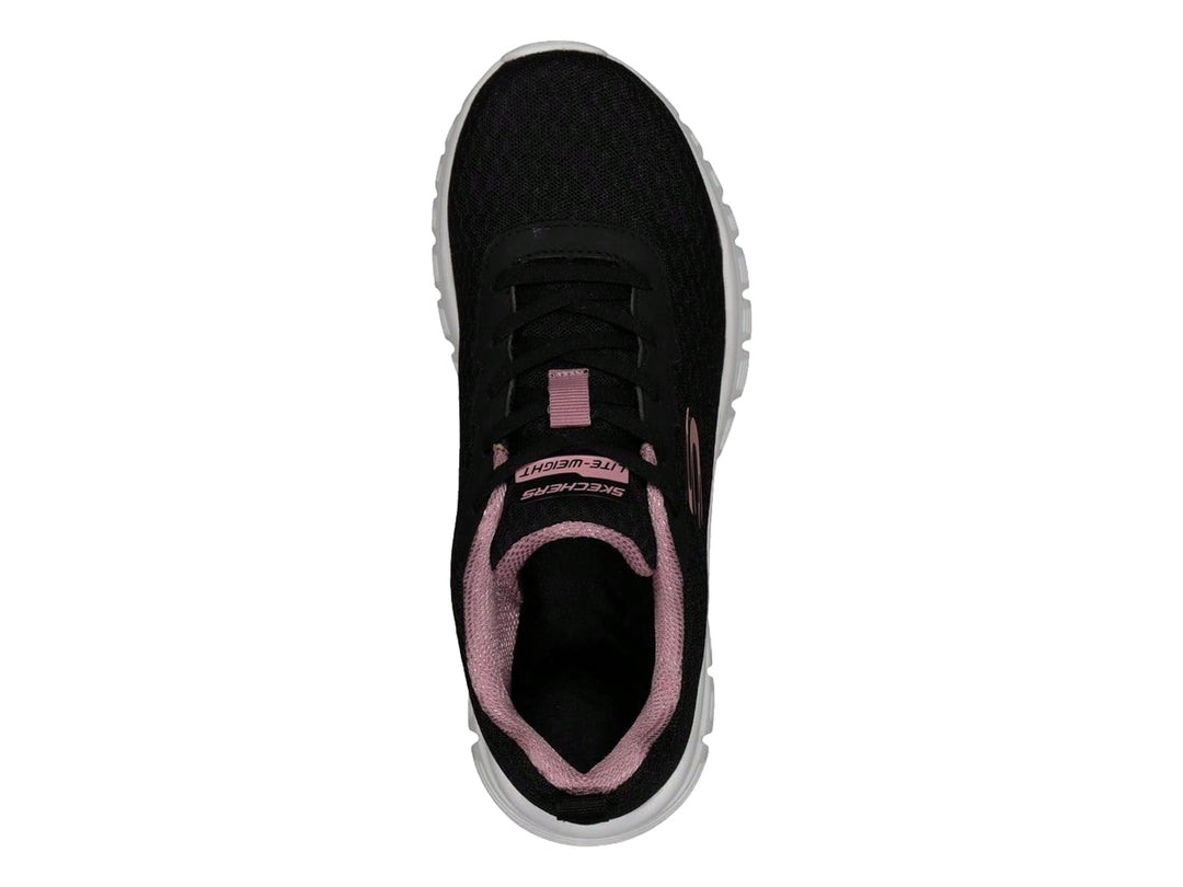 Tenis deportivos Skechers para mujer en color negro con suela blanca y detalles en rosa.