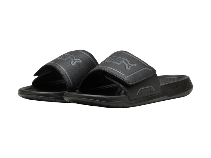 Sandalia PUMA RoyalCat Comfort 2 de color negro, vista lateral sobre fondo blanco.