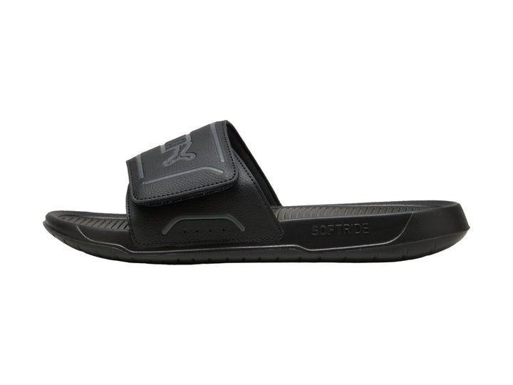 Sandalia PUMA RoyalCat Comfort 2 de color negro, vista lateral sobre fondo blanco.