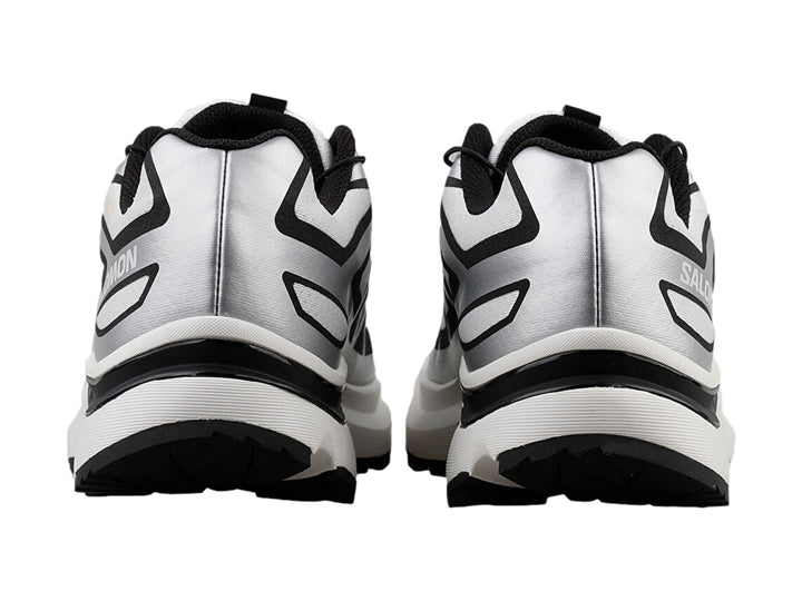 Tenis deportivos Salomon XT-EVR en color blanco con detalles y suela en negro.