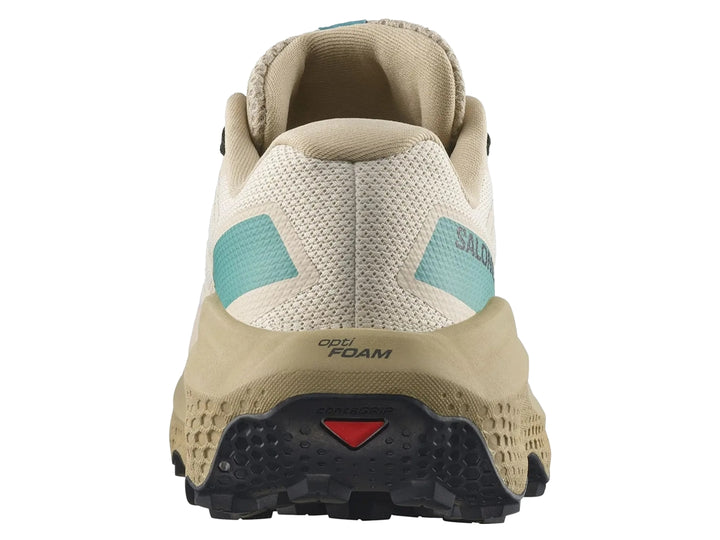 Tenis deportivos Salomon Ultra Flow 2 color café claro con detalles turquesa y suela negra.