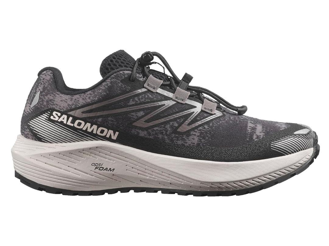 Tenis deportivos Salomon Aero Flow color gris oscuro con suela gris claro y agujetas negras.