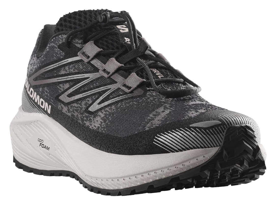 Tenis deportivos Salomon Aero Flow color gris oscuro con suela gris claro y agujetas negras.