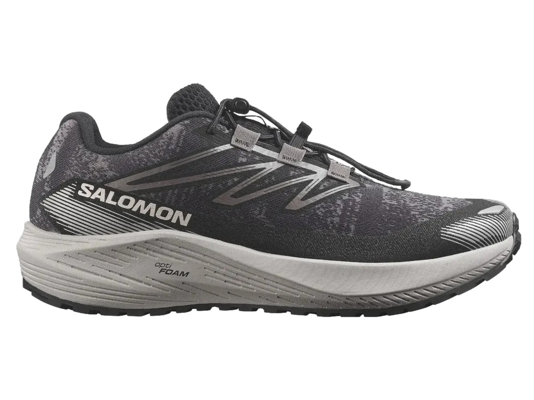 Tenis deportivos Salomon Aero Flow color gris con suela blanca y detalles en blanco.