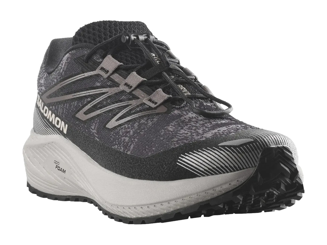 Tenis deportivos Salomon Aero Flow color gris con suela blanca y detalles en blanco.