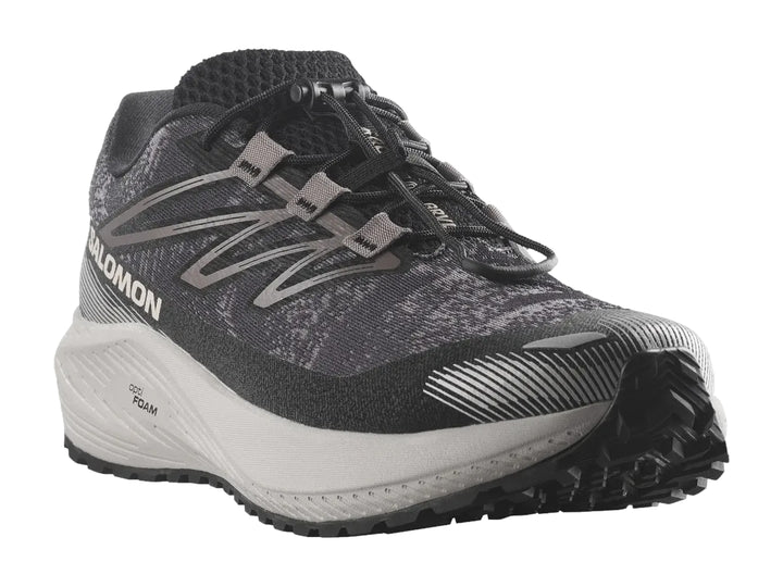 Tenis deportivos Salomon Aero Flow color gris con suela blanca y detalles en blanco.