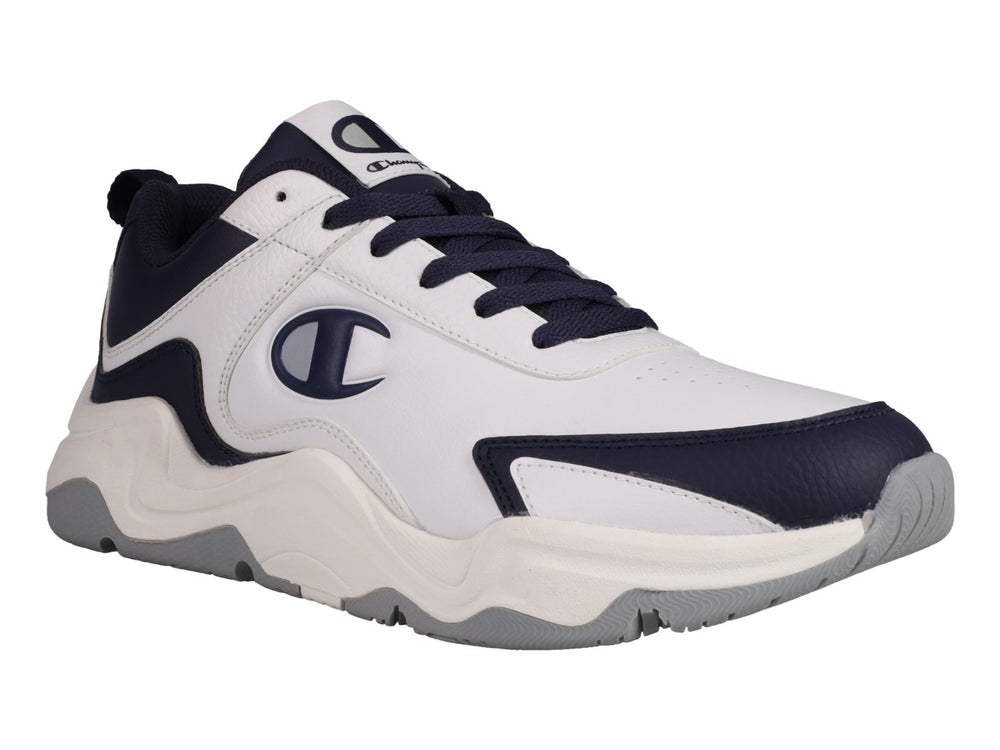 Tenis Champion Hyper V3 Next en color blanco con detalles en azul marino y suela blanca y gris.