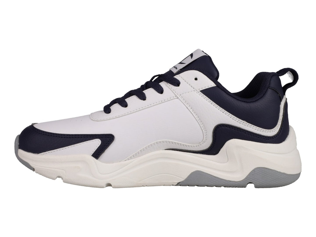 Tenis Champion Hyper V3 Next en color blanco con detalles en azul marino y suela blanca y gris.