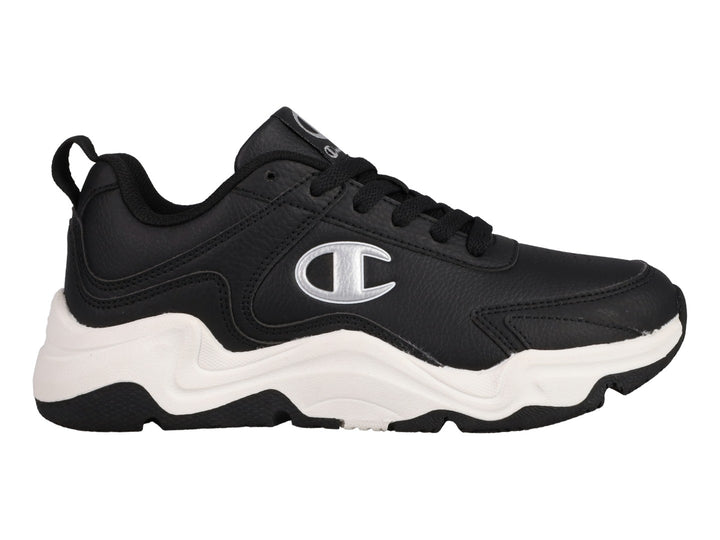 Tenis Champion Hyper V3 Next color negro con suela blanca gruesa y logo plateado lateral.
