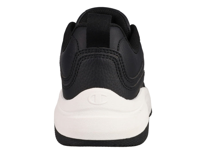 Tenis Champion Hyper V3 Next color negro con suela blanca gruesa y logo plateado lateral.
