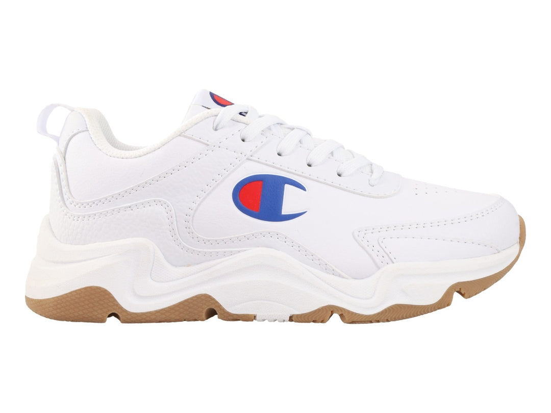 Tenis Champion Hyper V3 Next en color blanco con suela color goma y logotipo lateral en rojo y azul.