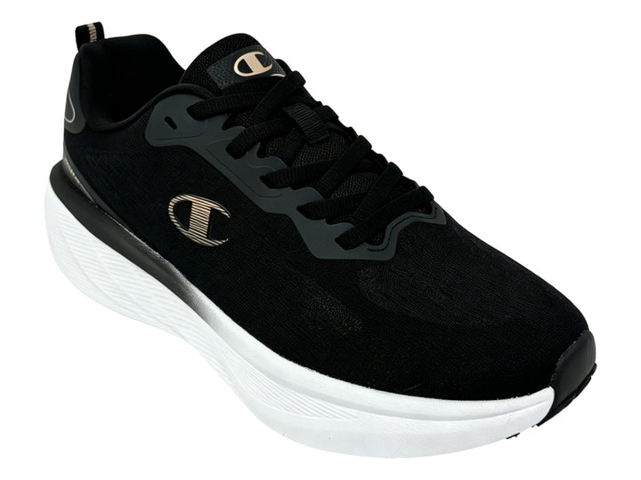 Tenis Champion Cross Kicks en color negro con suela blanca y detalles dorados
