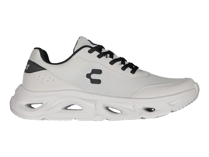 Tenis Charly Light Sport en color blanco con detalles y cordones en negro, vista lateral sobre fondo blanco.