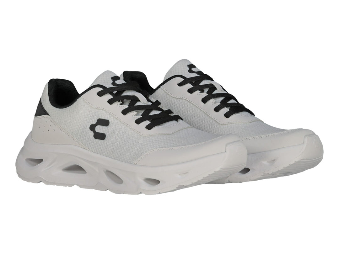 Tenis Charly Light Sport en color blanco con detalles y cordones en negro, vista lateral sobre fondo blanco.