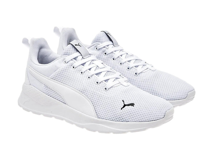 Tenis Puma Anzarun Lite en color blanco total con malla transpirable y suela blanca.