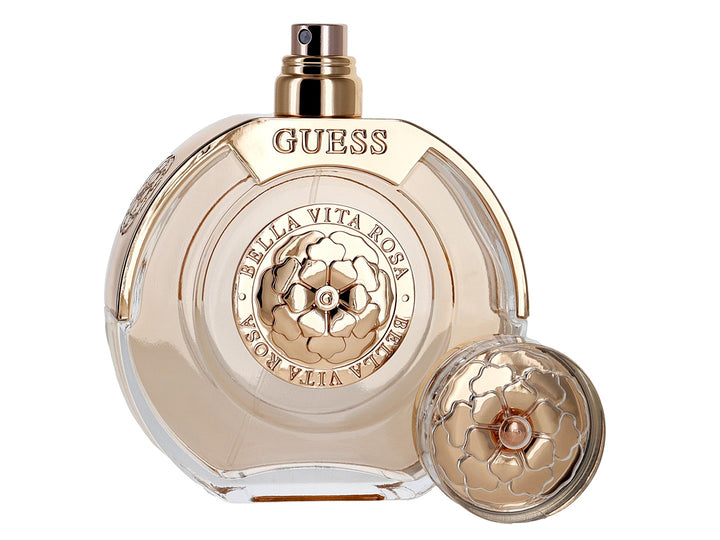 Caja de perfume Guess Bella Vita Rosa de 100ml en color oro rosa brillante con detalles florales en relieve.