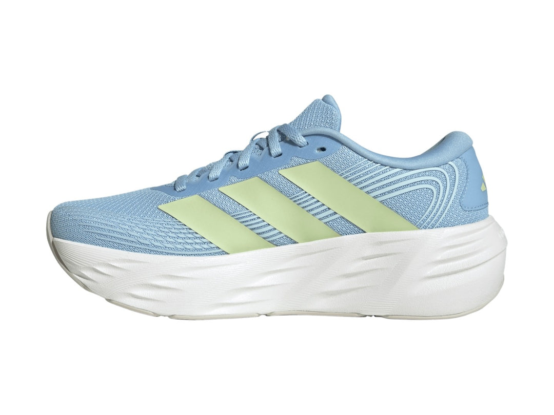 Tenis Adidas Galaxy 8 en color azul con franjas verde lima y suela blanca gruesa