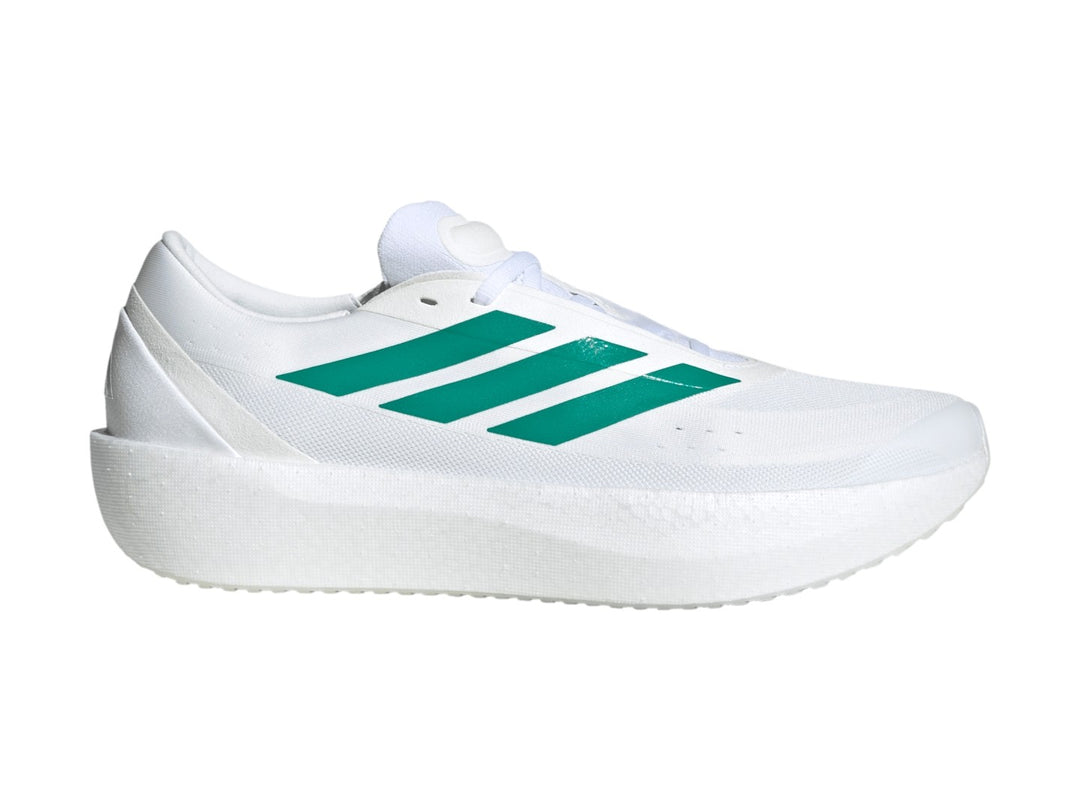 Tenis Adidas Zenboost en color blanco con tres franjas verdes laterales y suela blanca gruesa.