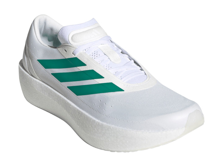 Tenis Adidas Zenboost en color blanco con tres franjas verdes laterales y suela blanca gruesa.