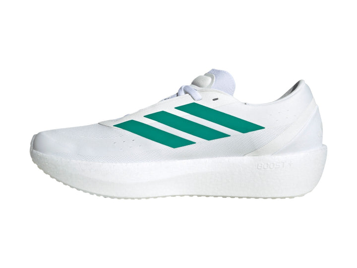 Tenis Adidas Zenboost en color blanco con tres franjas verdes laterales y suela blanca gruesa.