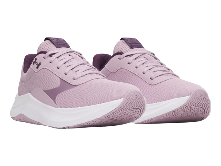 Tenis Under Armour Aurora 3 en color rosa malva con suela blanca y detalles en morado