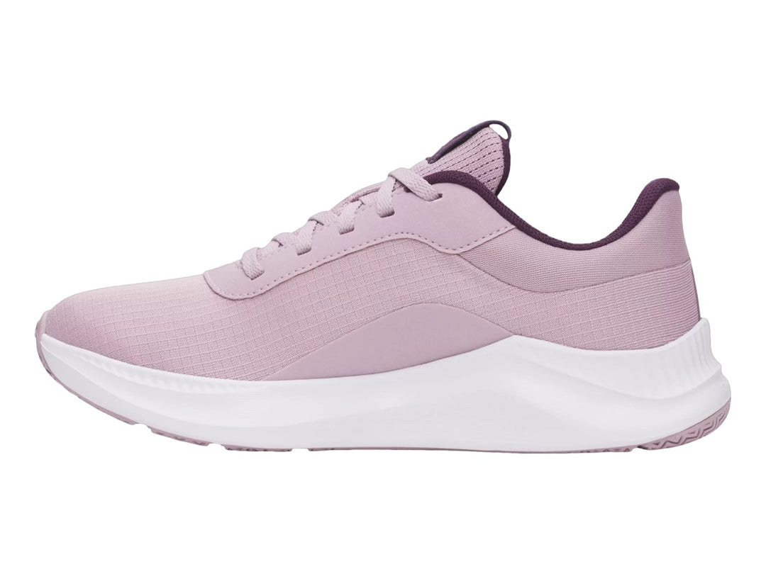 Tenis Under Armour Aurora 3 en color rosa malva con suela blanca y detalles en morado