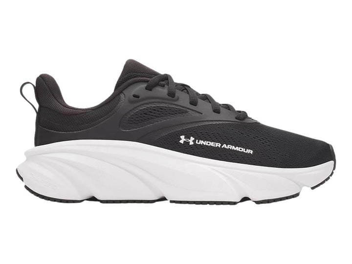 Tenis Under Armour Rogue 6 en color negro con suela blanca gruesa y diseño deportivo.