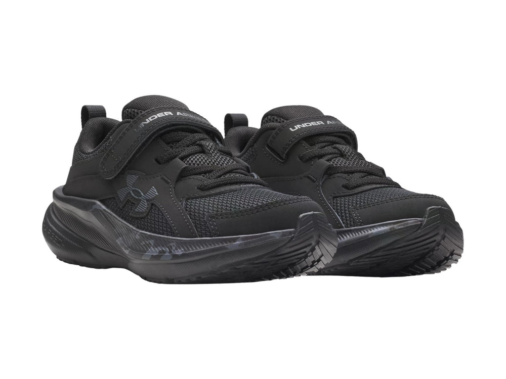 Tenis Under Armour BPS Assert 11 en color negro con detalles en antracita y cierre de velcro.