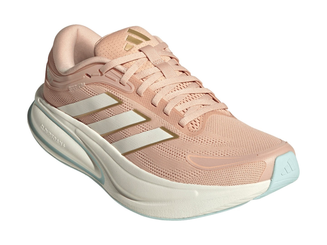 Tenis Adidas Response 2 en color rubor con franjas blancas y suela blanca con detalles en menta.
