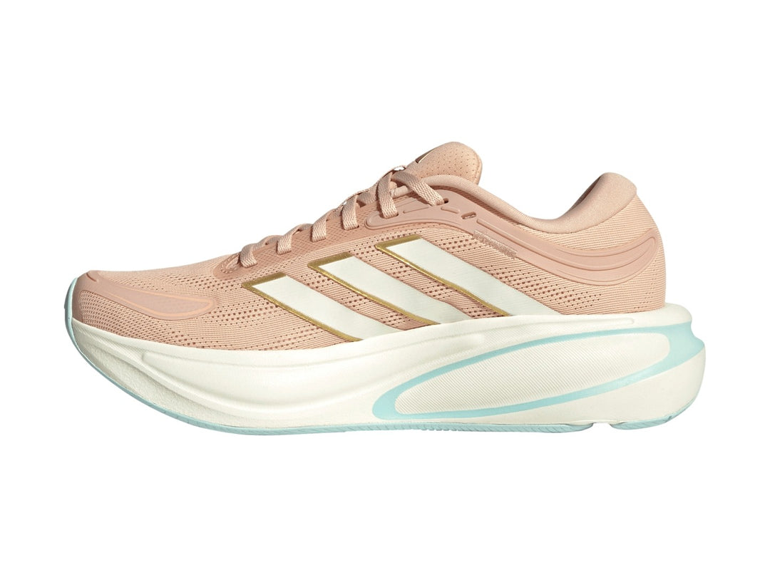 Tenis Adidas Response 2 en color rubor con franjas blancas y suela blanca con detalles en menta.