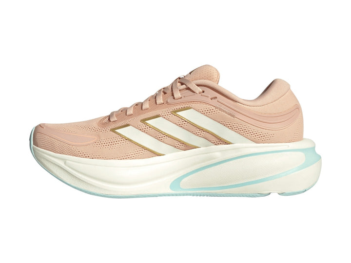 Tenis Adidas Response 2 en color rubor con franjas blancas y suela blanca con detalles en menta.