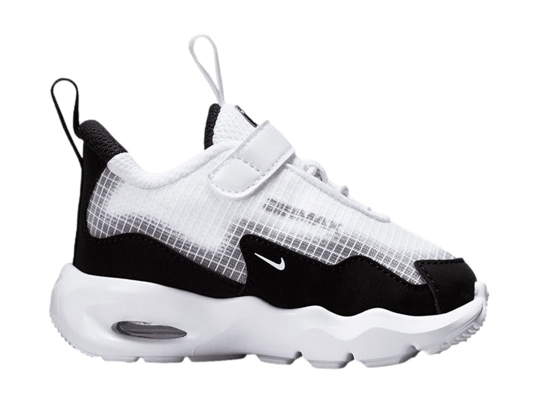 Tenis Nike Air Max Nova en colores blanco y negro con suela blanca gruesa y cierre de velcro.