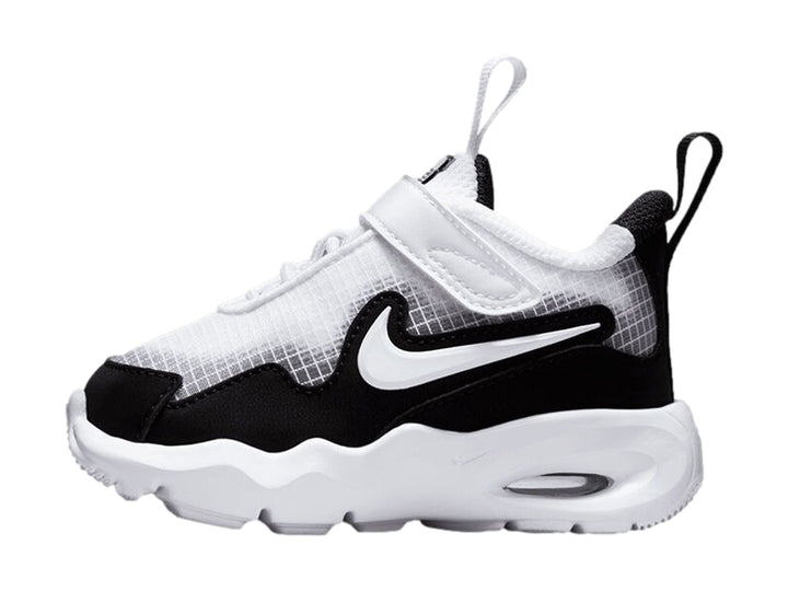Tenis Nike Air Max Nova en colores blanco y negro con suela blanca gruesa y cierre de velcro.
