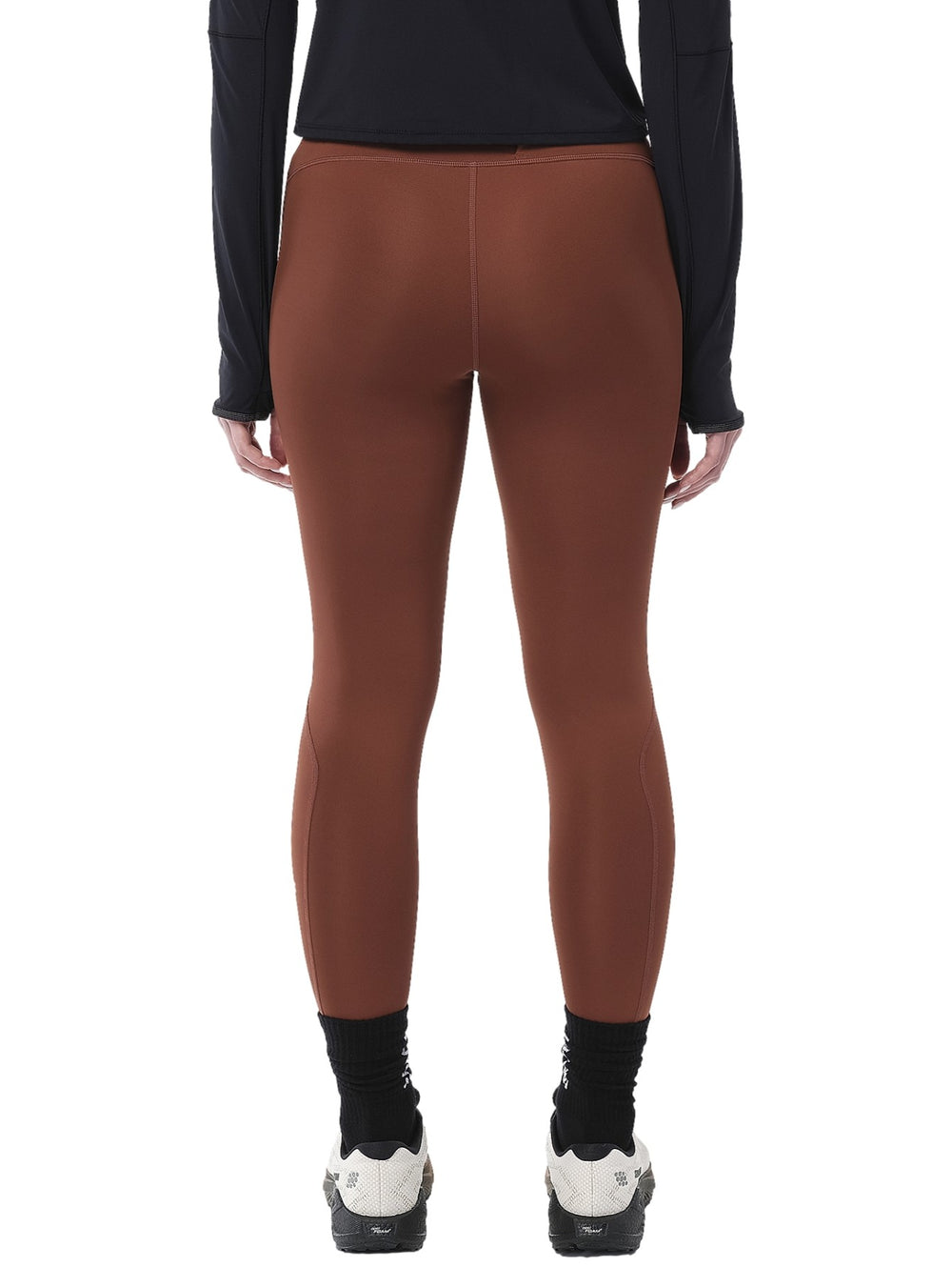 Leggings deportivos Salomon Shakeout Core Tights en color Burnt Umber ajustados al cuerpo.