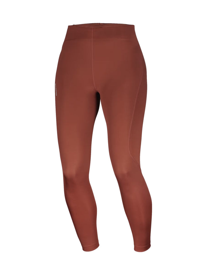 Leggings deportivos Salomon Shakeout Core Tights en color Burnt Umber ajustados al cuerpo.
