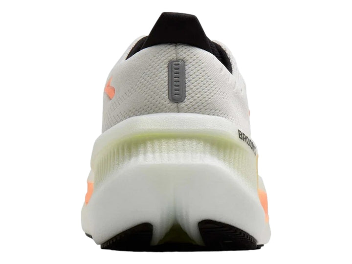 Tenis Brooks Glycerin Max 2 color blanco con detalles en amarillo y naranja y suela blanca gruesa
