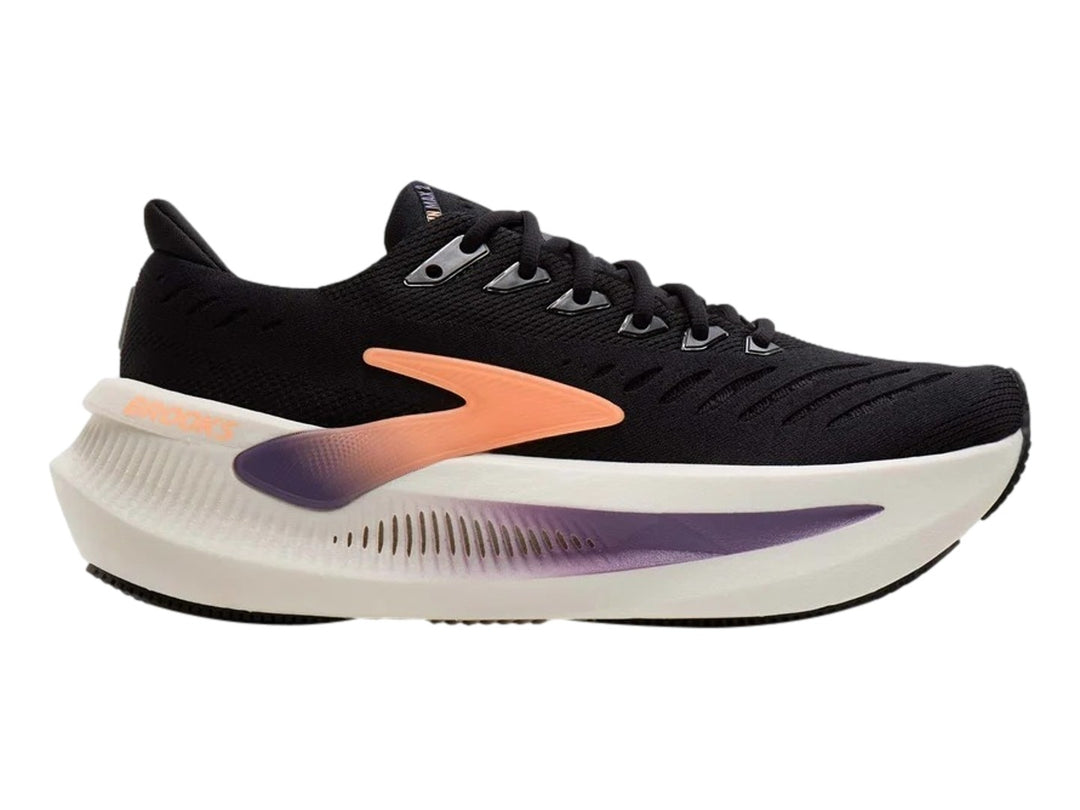 Tenis Brooks Glycerin Max 2 en color negro con detalles en durazno y morado y suela blanca gruesa.