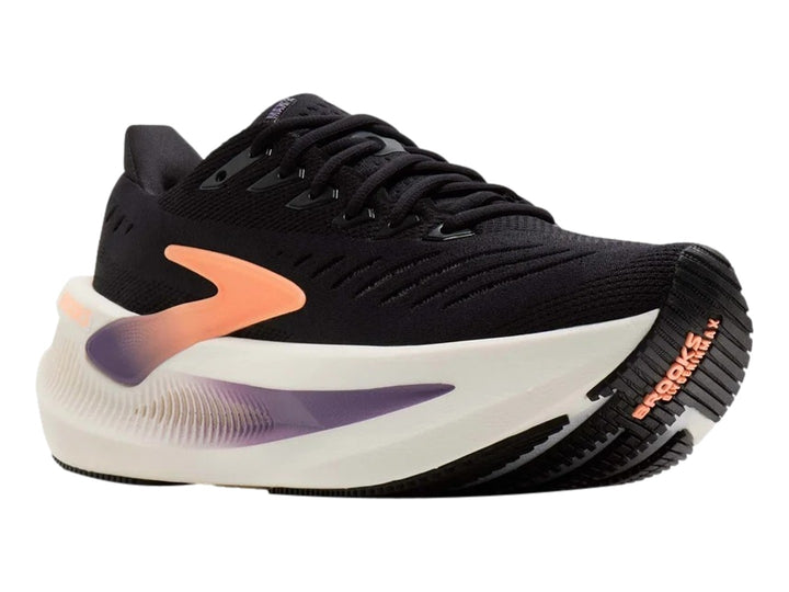 Tenis Brooks Glycerin Max 2 en color negro con detalles en durazno y morado y suela blanca gruesa.