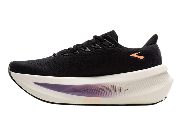 Tenis Brooks Glycerin Max 2 en color negro con detalles en durazno y morado y suela blanca gruesa.