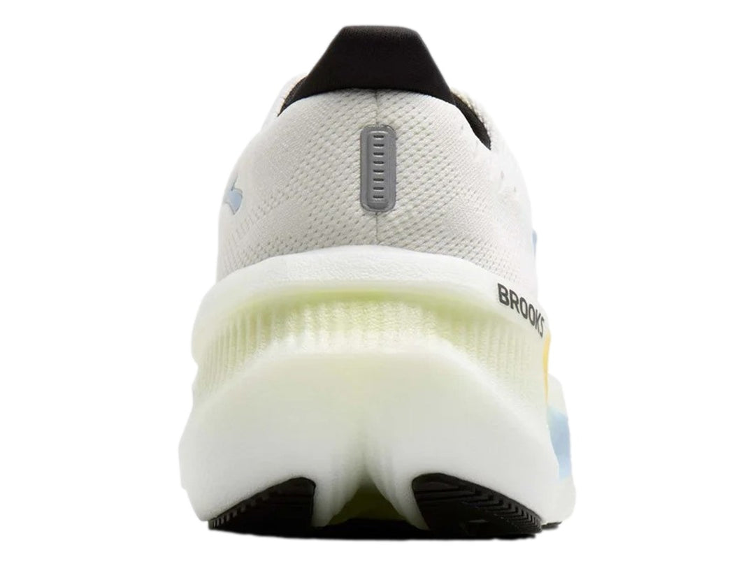 Tenis Brooks Glycerin Max 2 en color blanco con detalles degradados en azul y amarillo y agujetas negras.