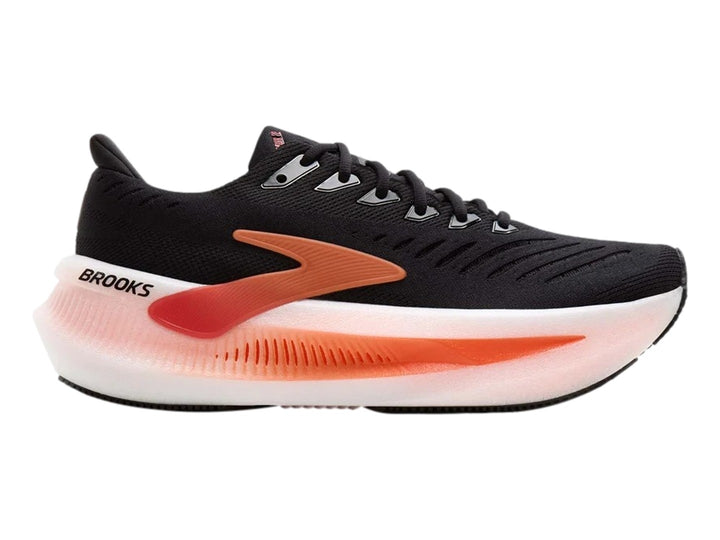Tenis Brooks Glycerin Max 2 en color negro con detalles en naranja y suela blanca gruesa.