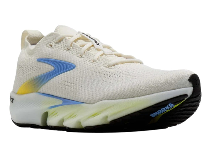 Tenis Brooks Glycerin Flex color blanco con detalles en amarillo y azul, vista lateral sobre fondo blanco.