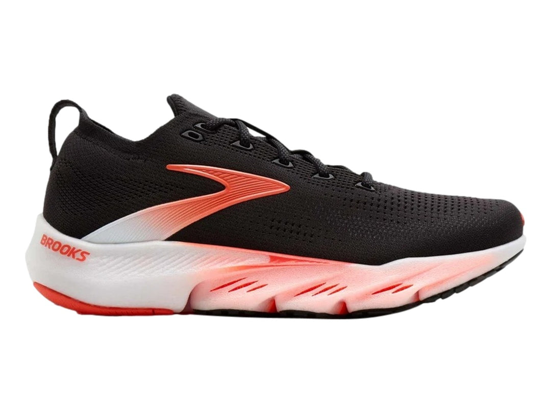 Tenis Brooks Glycerin Flex en color negro con detalles en naranja y blanco, vista lateral.
