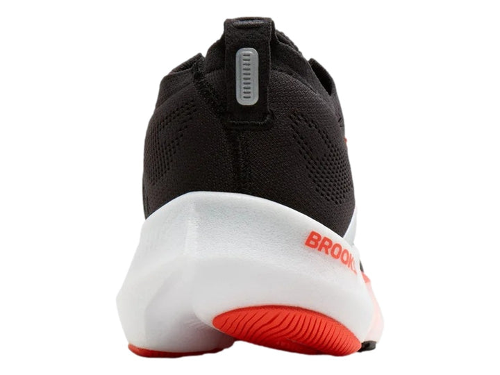 Tenis Brooks Glycerin Flex en color negro con detalles en naranja y blanco, vista lateral.