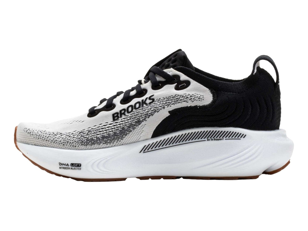 Tenis Brooks Adrenaline GTS 25 en color blanco con detalles en negro y suela blanca y café.
