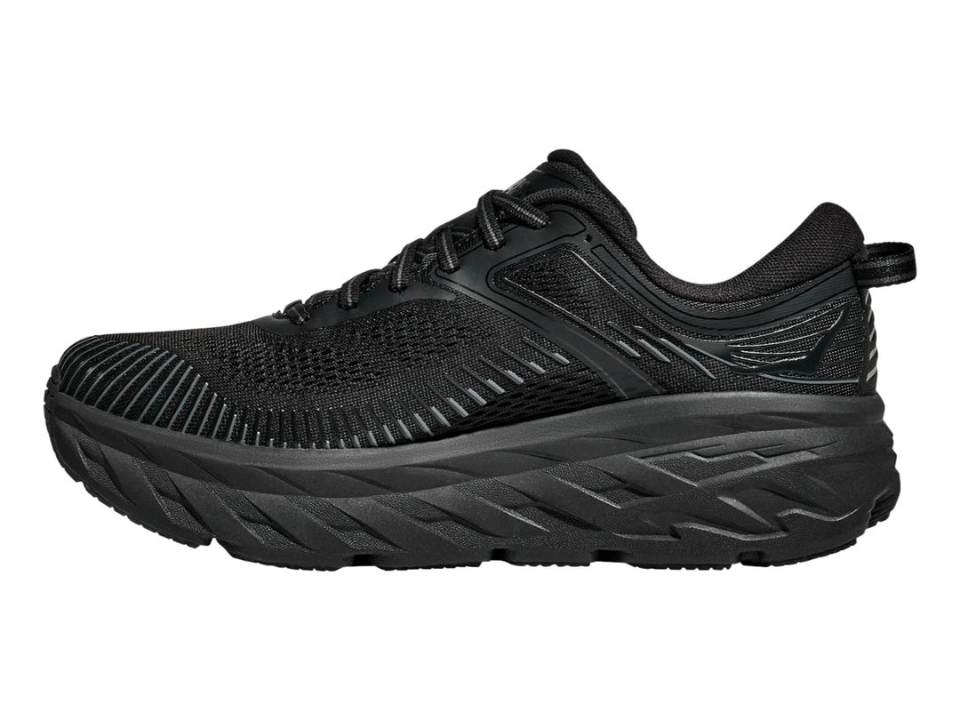 Tenis Hoka Bondi 7 en color negro total, con suela gruesa y malla transpirable.