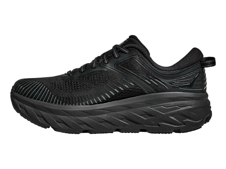 Tenis Hoka Bondi 7 en color negro total, con suela gruesa y malla transpirable.