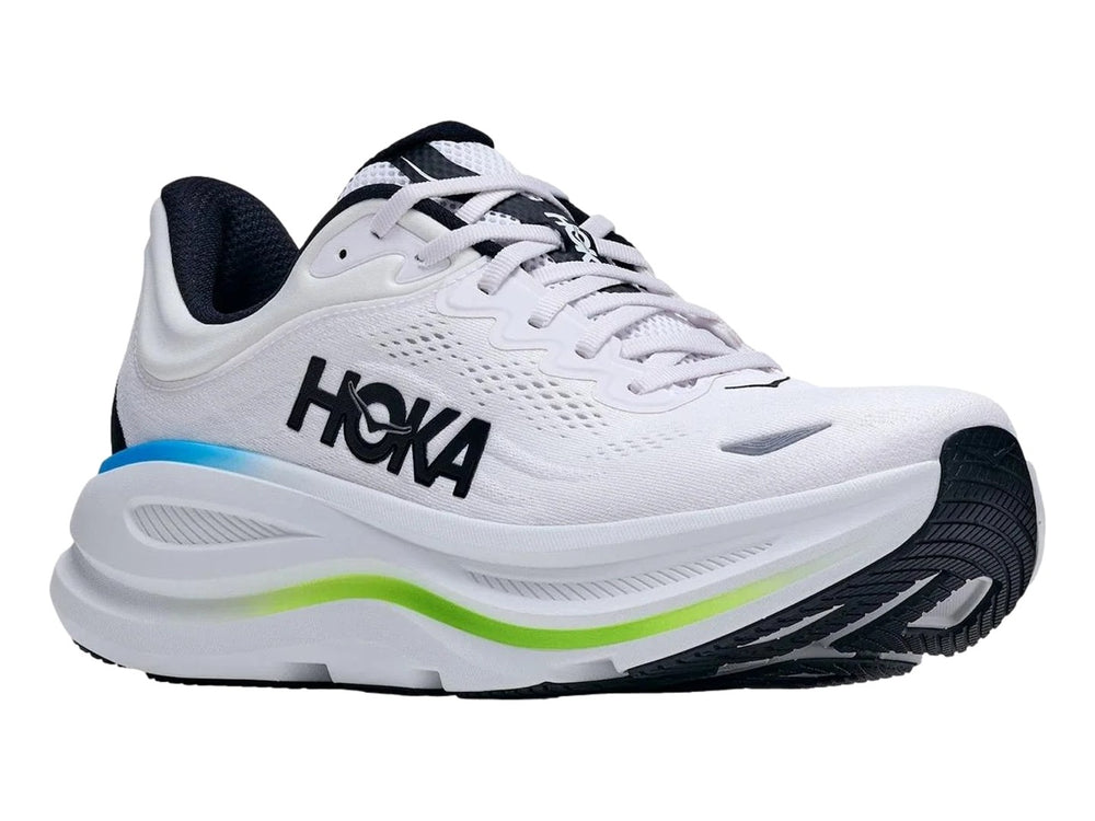 Tenis HOKA Bondi 9 color blanco con detalles en azul y verde neón y suela blanca gruesa